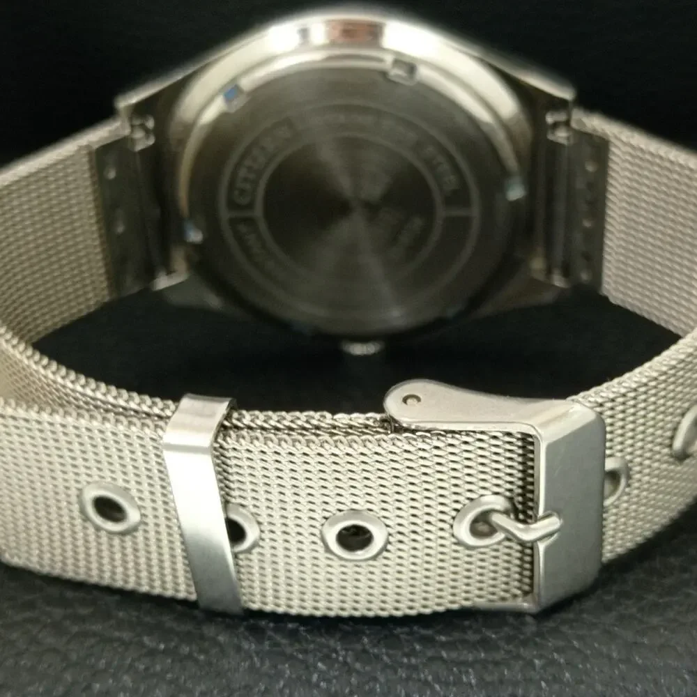 Vintage 1988 Citizen Manual Mens Silver Watch W/daydate & White accents